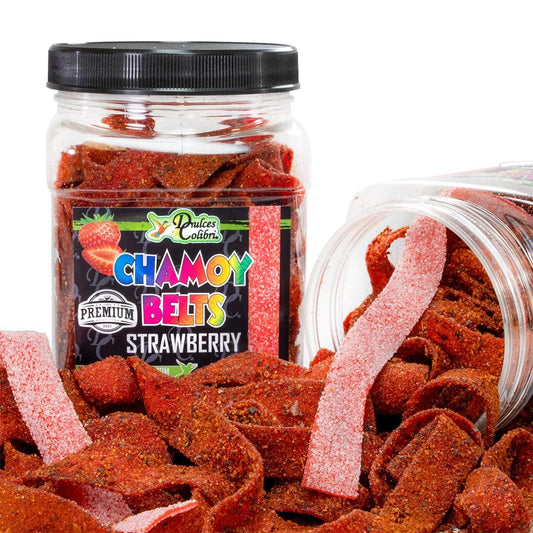 A clear plastic jar filled with red chamoy belts strawberry flavored gummy candies, with the label 'Dulces Colibri Premium Strawberry Chamoy Belts' on the lid.